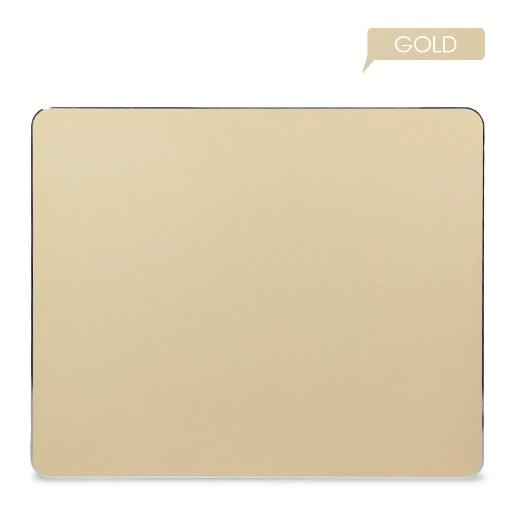 Aluminium alloy double-sided mouse pad in black finish on a desk for gaming or office use