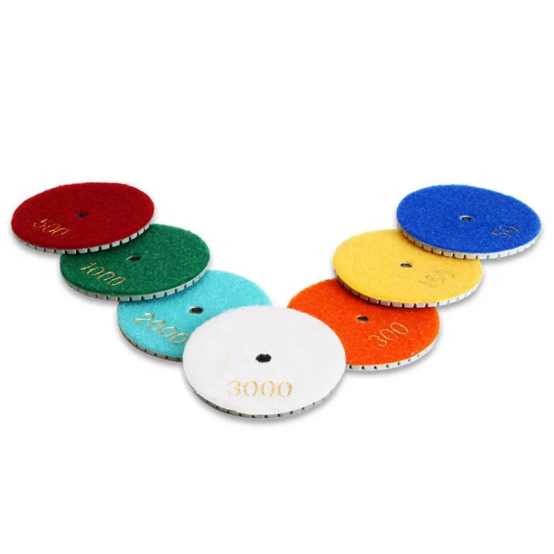Set of 10 stone polishing pads with diamond emery abrasive, ranging from 50 to 3000 grit.