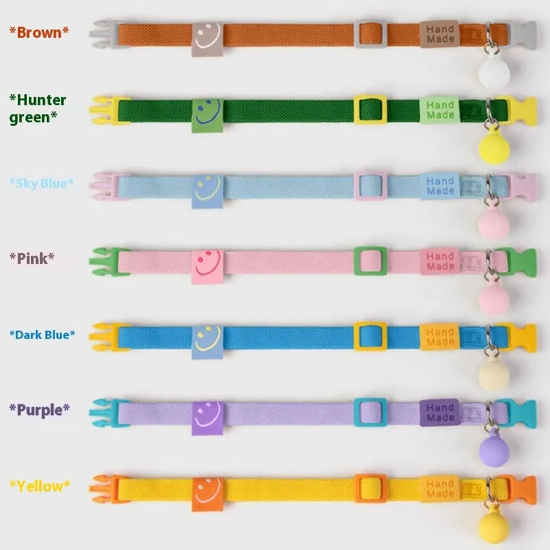 A high elasticity polyester dog collar for small dogs shown in various solid colours on a white background.