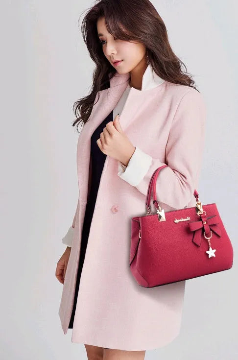 Women's medium cross section square PU casual shoulder handbag with belt decoration and soft handle