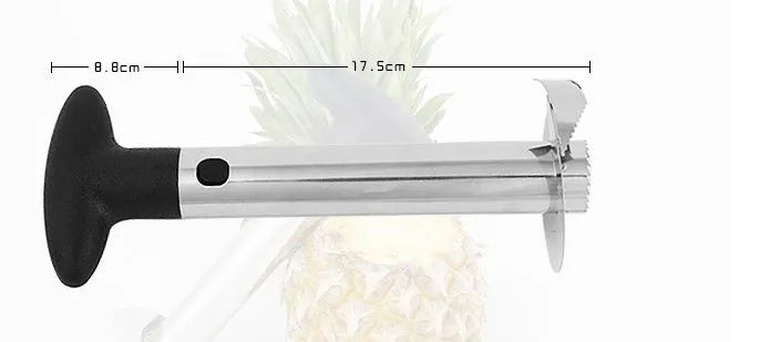 Stainless steel pineapple corer slicer with ABS handle on a kitchen worktop