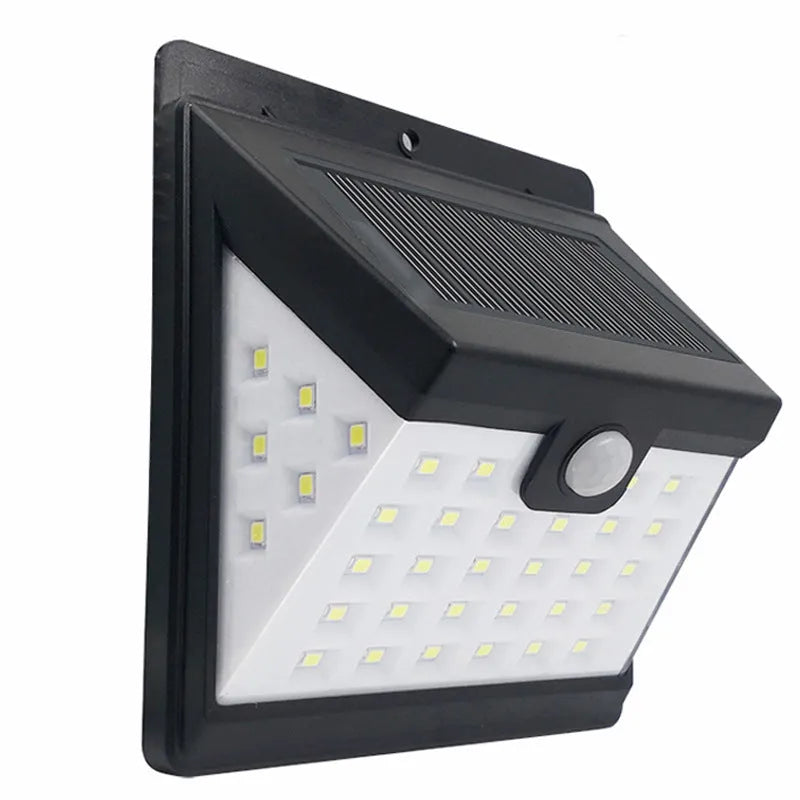 Solar induction wall light with LED array and motion sensor in front switch style