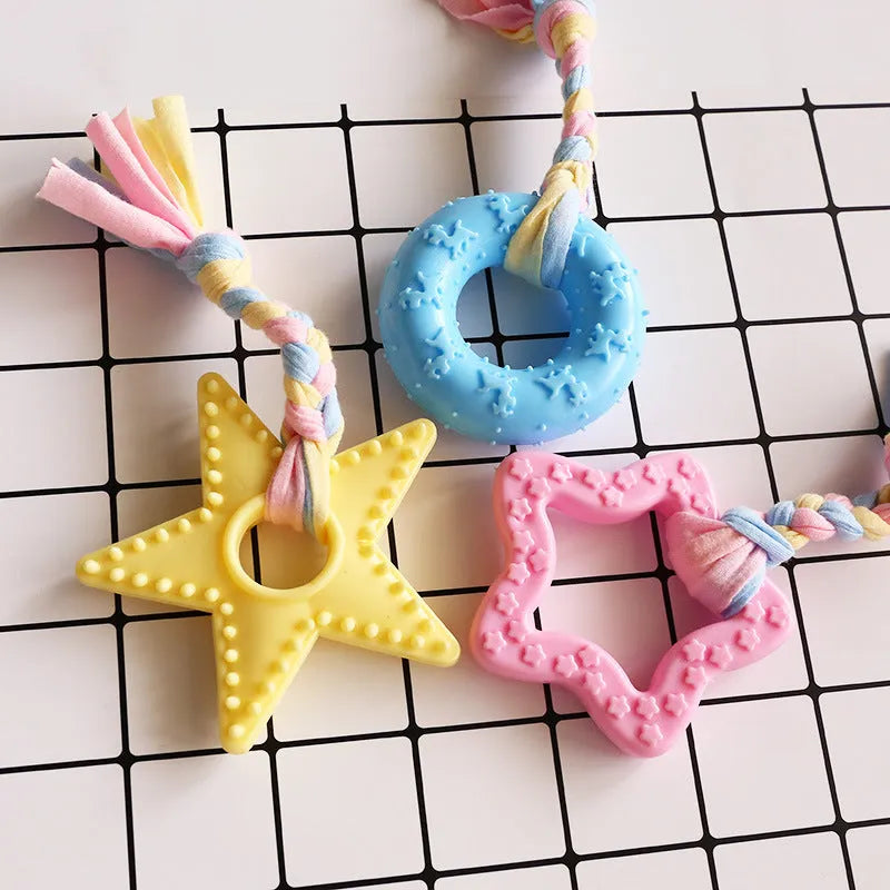 Non-toxic rubber dog chew toy in star shape with textured surface for teeth cleaning
