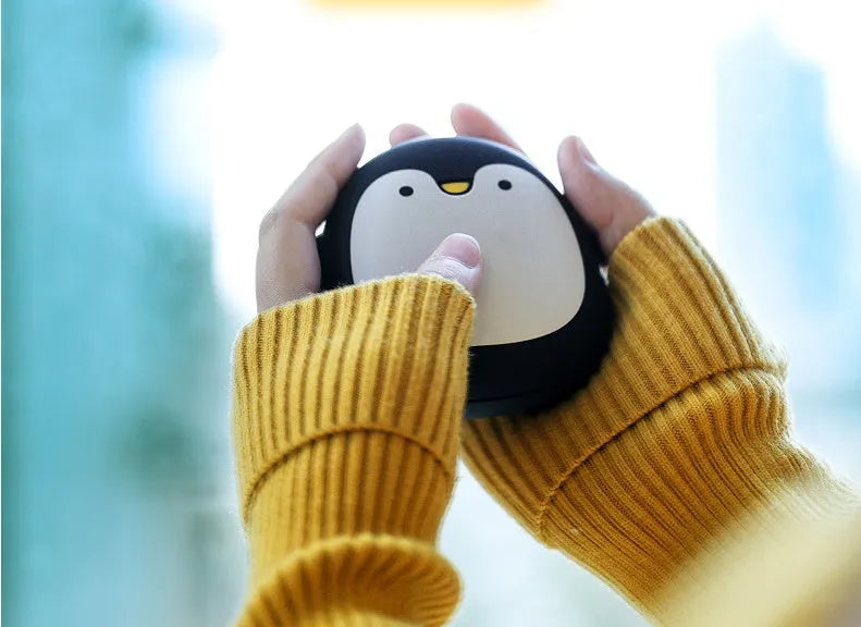 Cartoon penguin polar bear design USB rechargeable electric hand warmer power bank showing double-side heating