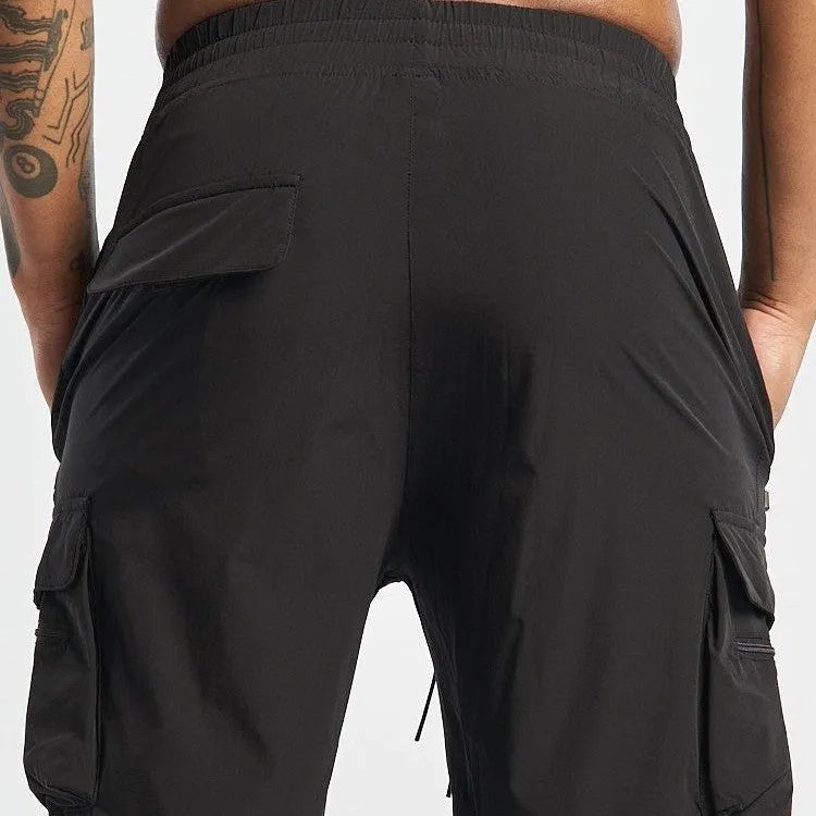 Black men's elastic fitness shorts with quick-dry lining for running and gym workouts