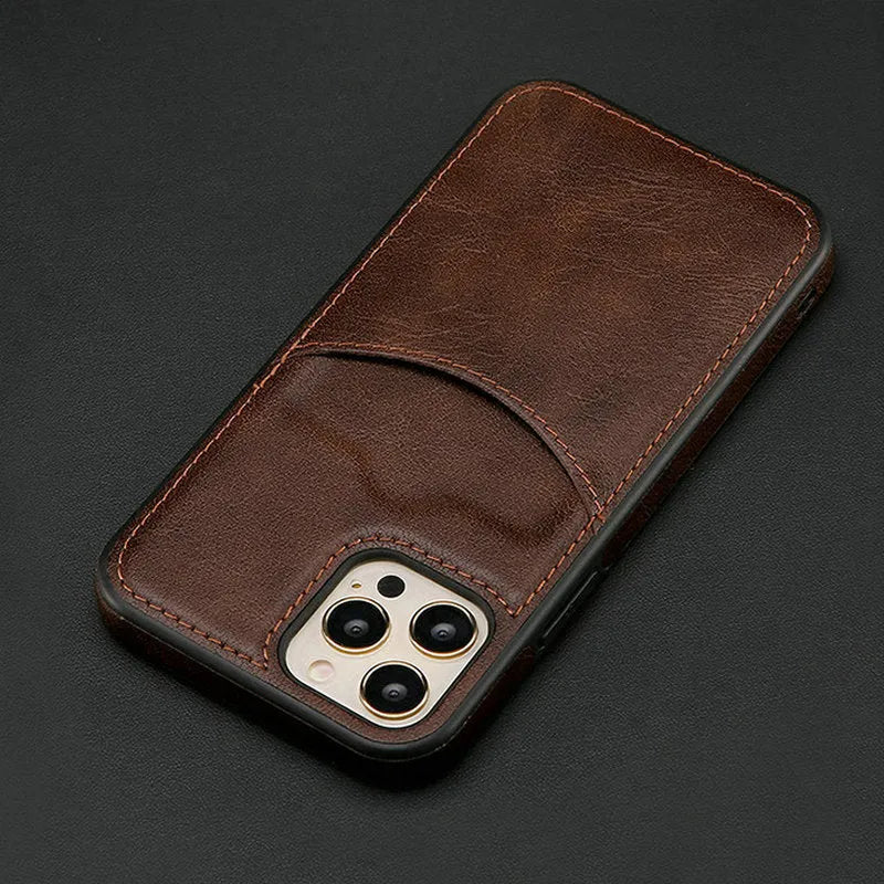 Dark blue PU leather protective case for various iPhone models on a table