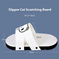 White slipper-style corrugated paper cat scratch board lying flat on a floor.