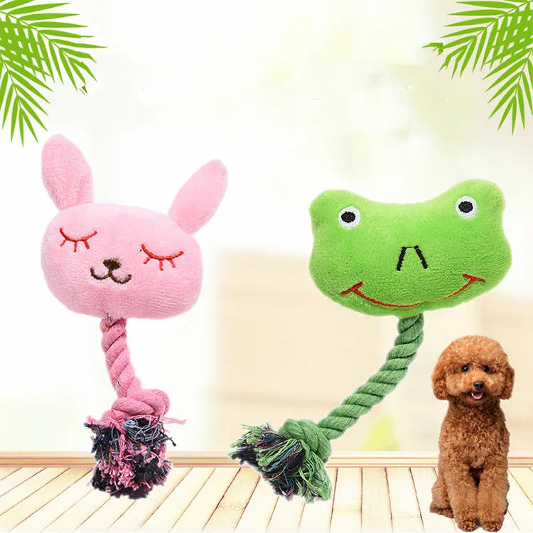 Pink rabbit-shaped plush squeaky dog toy with bite-resistant fabric placed on a light background