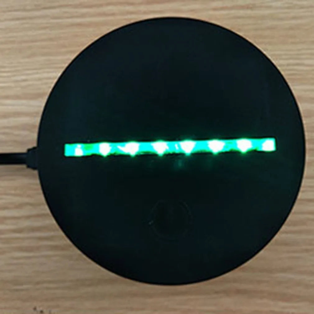Black LED owl cartoon night light with colourful touch-switch and acrylic shade on a table