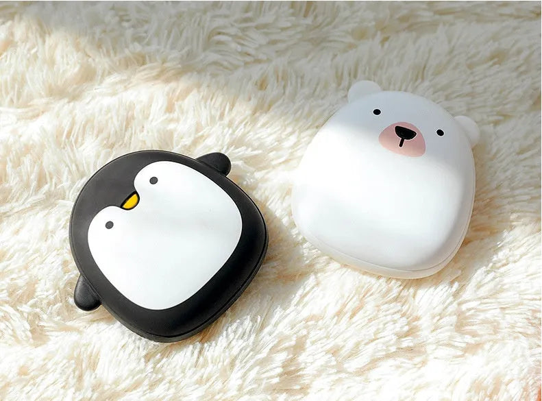 Cartoon penguin polar bear design USB rechargeable electric hand warmer power bank showing double-side heating