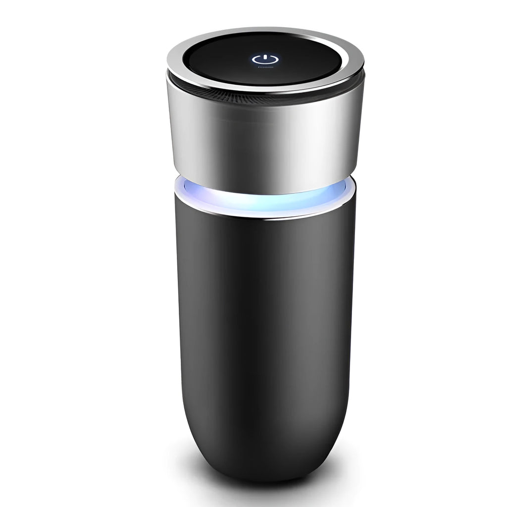 USB negative ion car air purifier in grey, compact 75x75x165mm size on a desk
