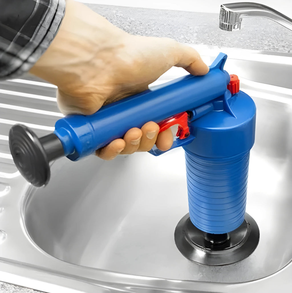 Plastic high-pressure air power drain blaster gun with four different size rubber adaptors for unblocking pipes.
