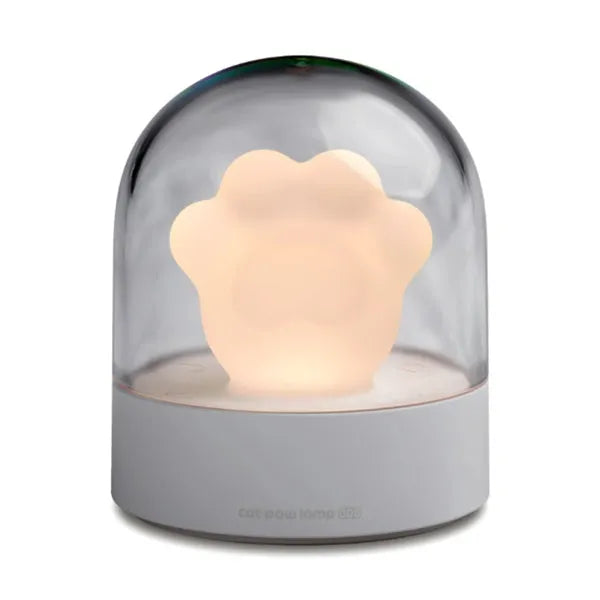 Grey cat paw shaped USB rechargeable night light with music box function on wooden desk