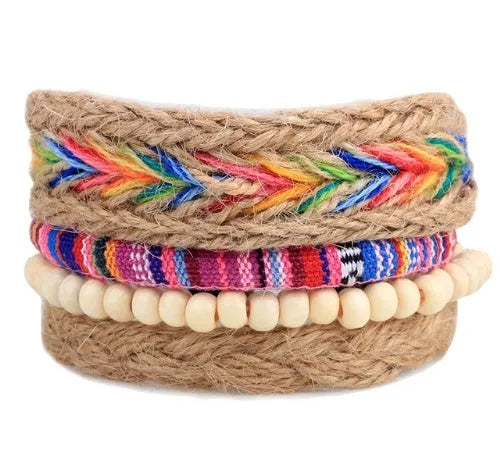 Handmade adjustable leather wrap bracelet with wooden beads on a wrist.