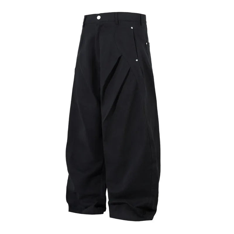 Black men's pleated casual trousers with a loose wide-leg fit on a hanger
