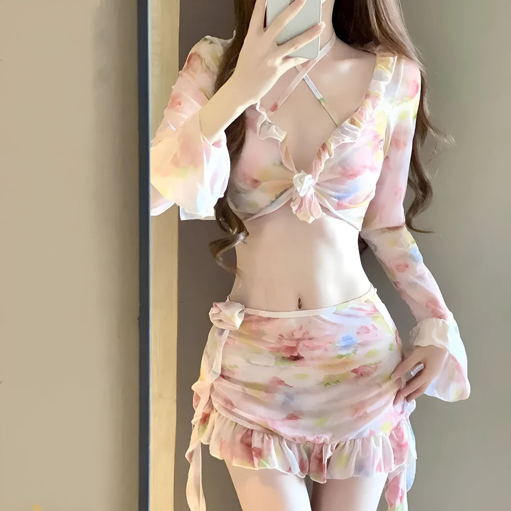Women's floral pattern bikini swimsuit in cherry blossom pink colour.