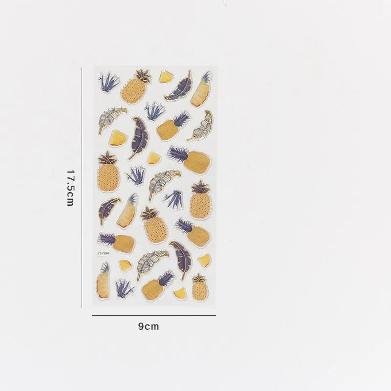 Sheet of six DIY fruit bronzing stickers showing grape, orange, passion fruit, peach, pineapple and strawberry designs.