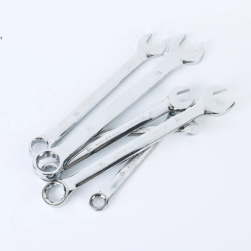 61-piece chrome vanadium steel socket and wrench set with ratchets, metric sockets, and combination wrenches laid out.