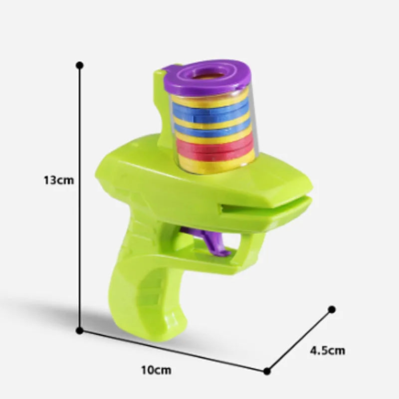 Green and purple manual cat toy launcher with foam discs for indoor pet play