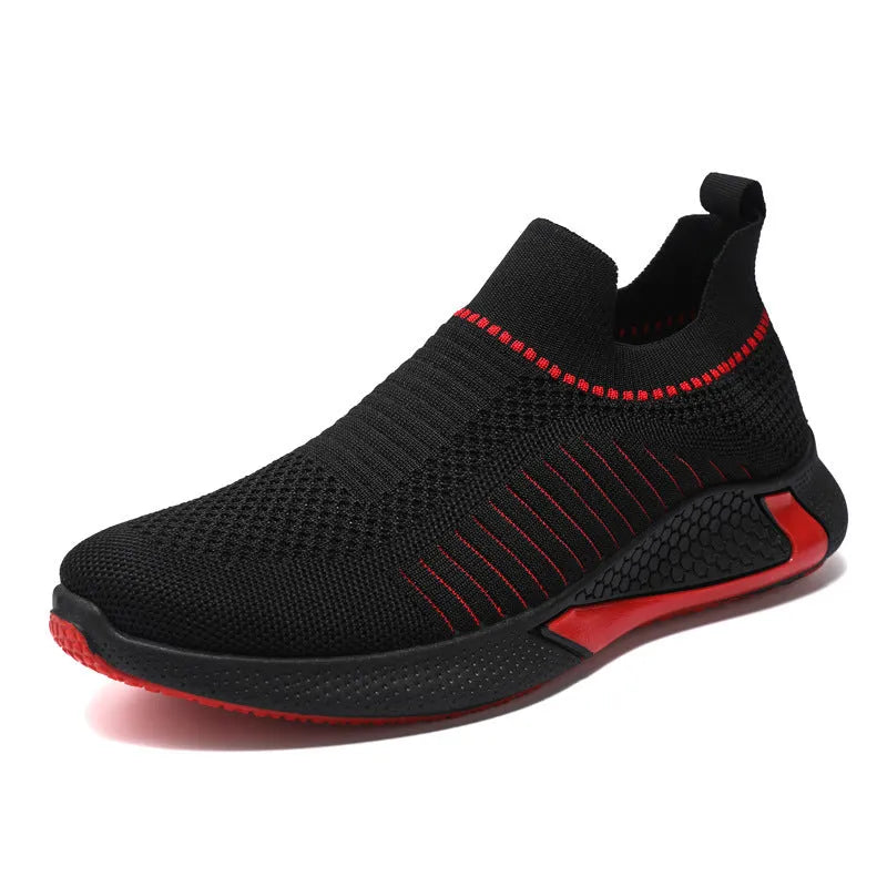 Men's black and white striped slip-on sneakers with lace-up front and mesh design.