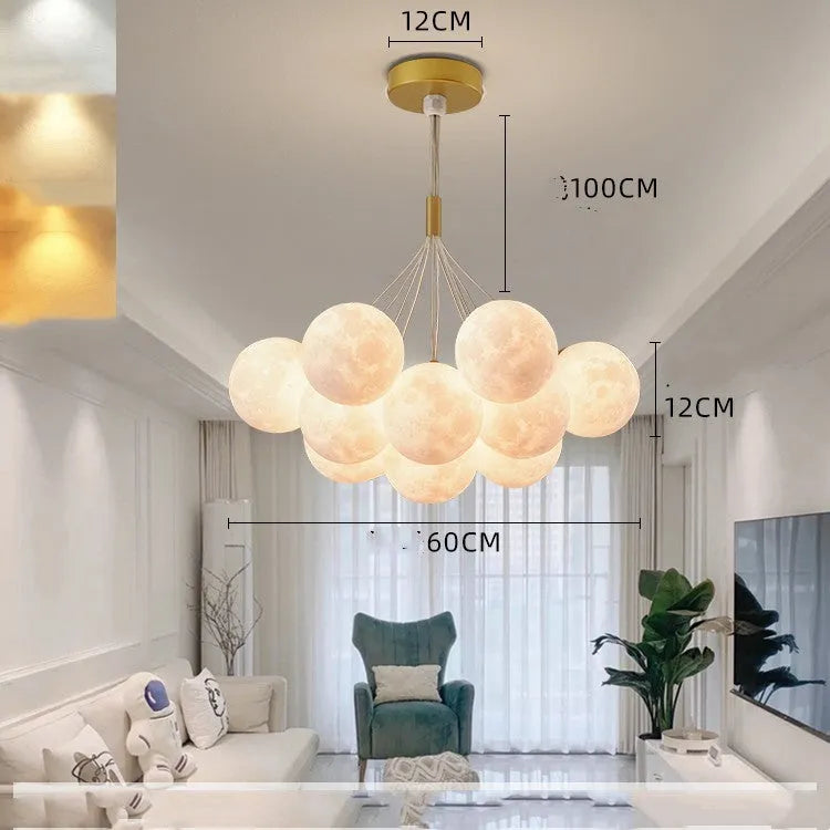 Nordic fish-shaped chandelier with moon bubble design in gold and black colour options