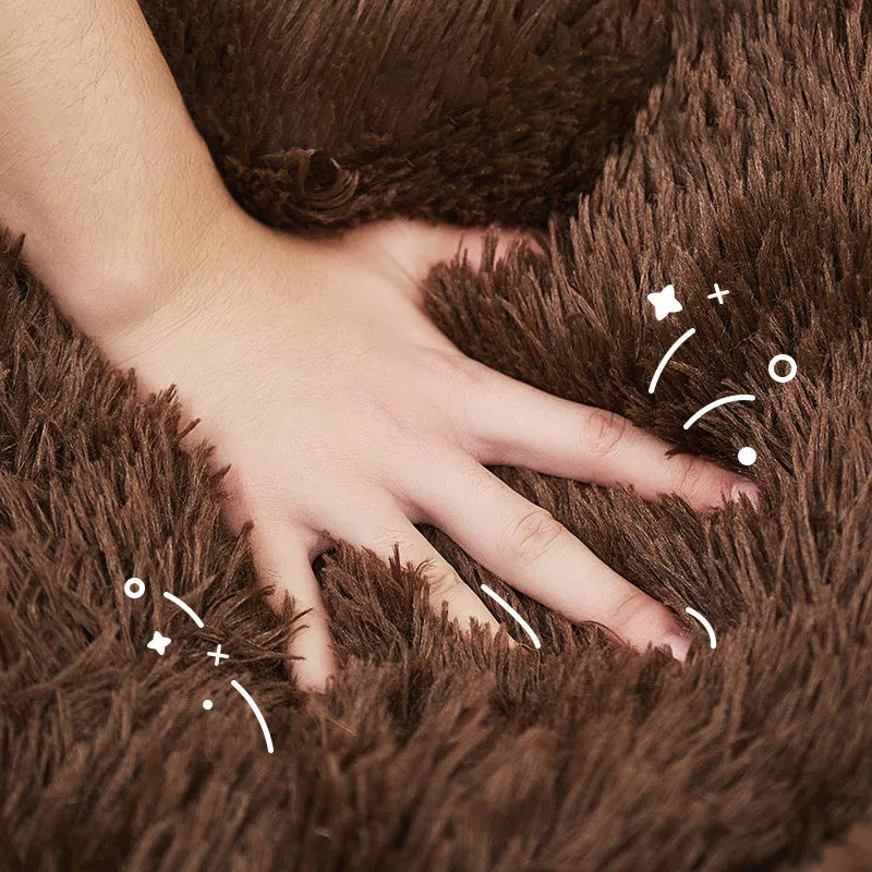 Plush faux fur sofa bed for a small dog or cat, shown in two size options.