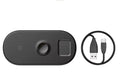 Smart three-in-one wireless charger for phone, watch, and earphones, shown in black on a desktop with a smartphone placed on the pad