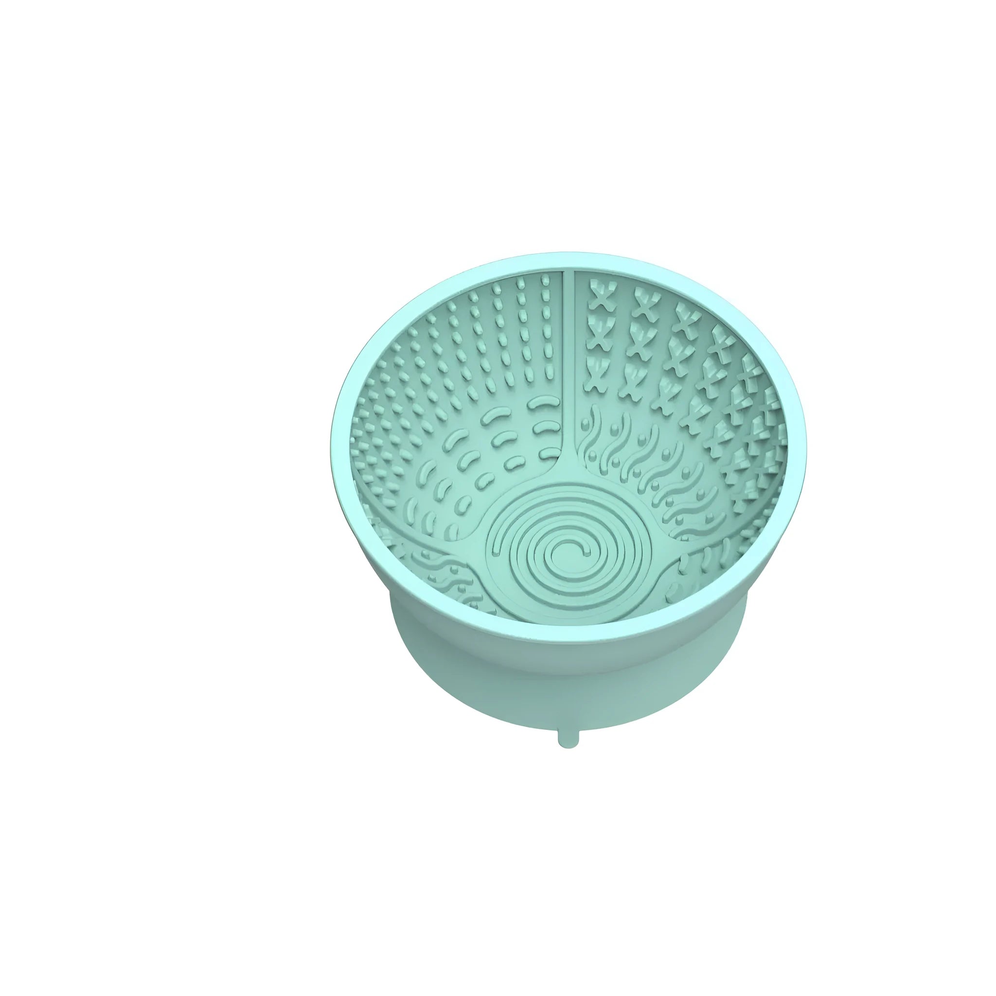 Cyan silicone dog bowl with textured slow feeder patterns and a suction cup base on a table.