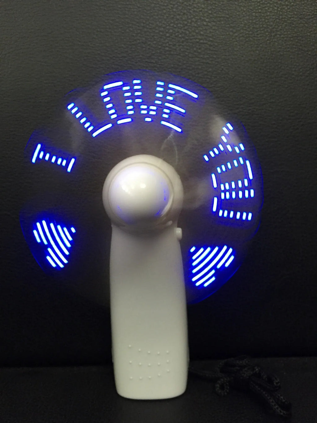White handheld flashing fan with LED love pattern in blue and red, 10.8cm size