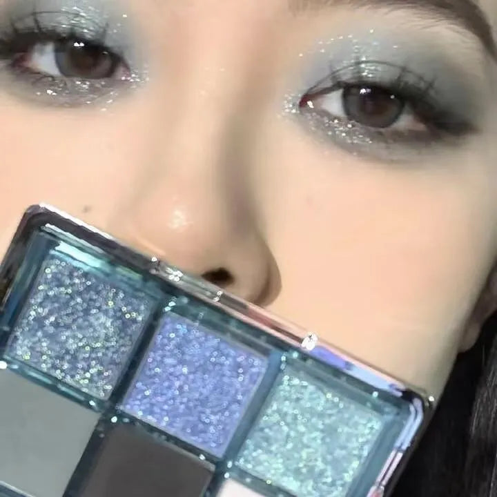 MUGELEEN 08 nine-colour eye shadow palette showing blue smoked tones with matte and shimmer finishes