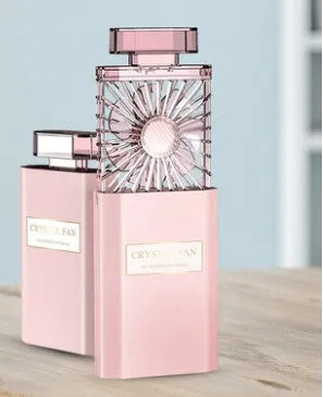 Pink portable perfume fan with rechargeable battery and fragrance misting function