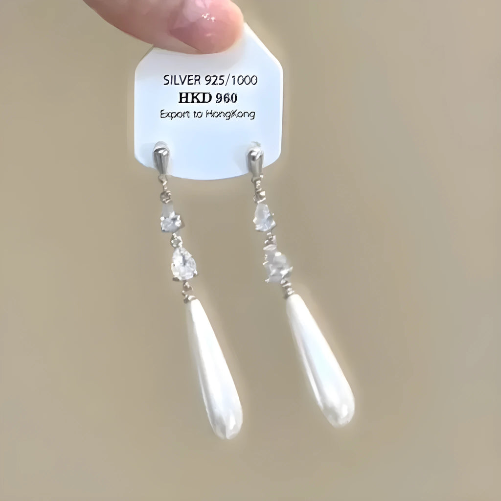 Geometric gold electroplated alloy ear clip jewellery with rhinestone and little stars tassel decoration