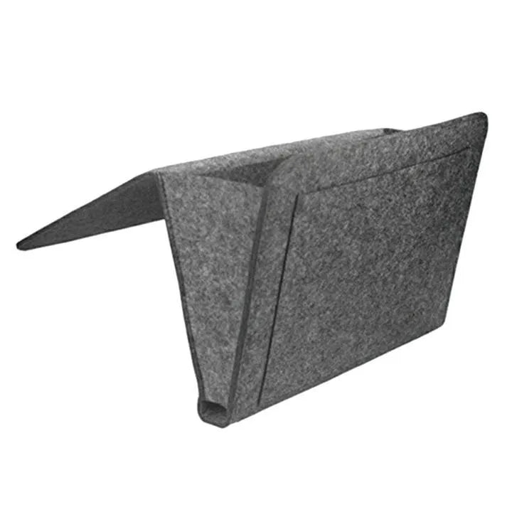 Felt bed storage bag with pocket in beige on a bed, small size 28x24cm, anti-slip organiser for mattress or sofa