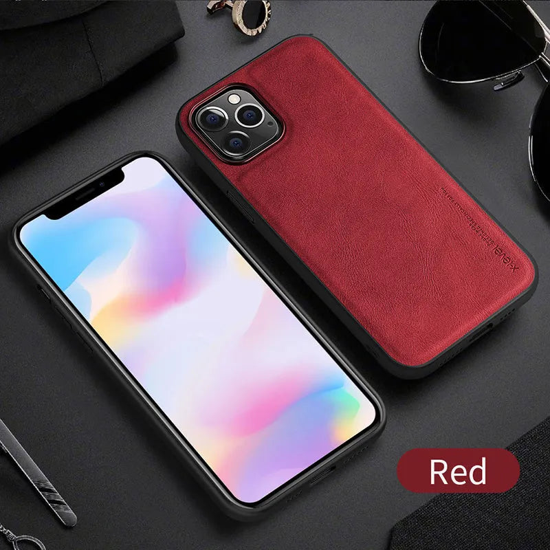 Black PU leather iPhone 12 phone case with soft TPU sides on a wooden table.