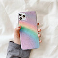 Rainbow gradient TPU phone case with striped design on an iPhone.