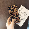 Leopard print silicone phone case for iPhone models showing colourful pattern and protective design