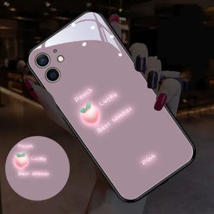 White luminous iPhone case with painted purple daisy design and voice-activated colour light.