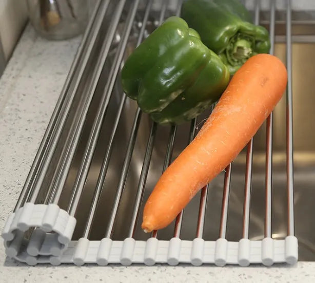 Stainless steel folding kitchen sink drain rack shown in a choice of colours