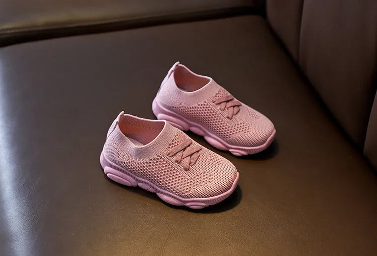 Children's fabric slip-on shoes with non-slip rubber soles in white, black, pink or grey colours