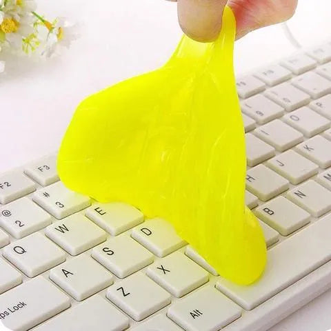 Blue and yellow blocks of magic cleaning gel adhesive putty for dust removal, 160g size.