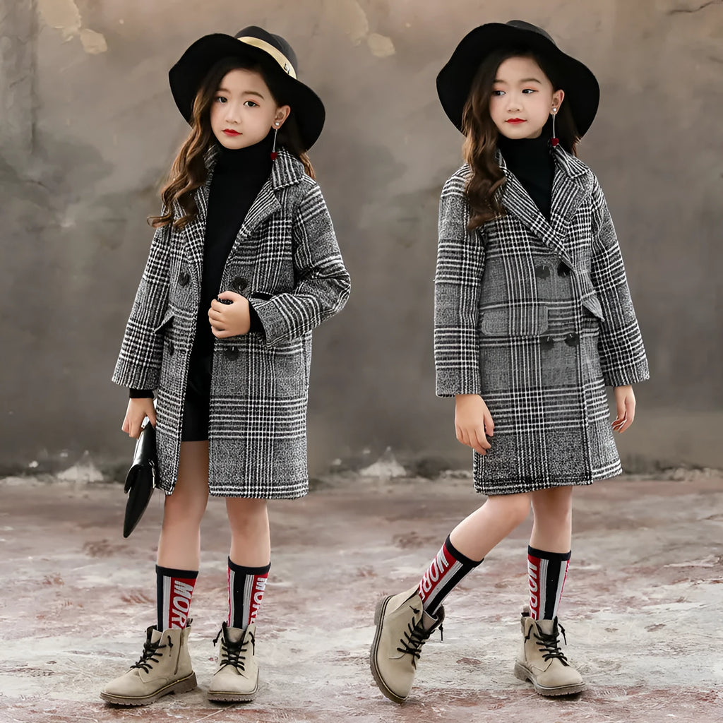 Girls grey and white houndstooth plaid coat with suit collar and long sleeves.