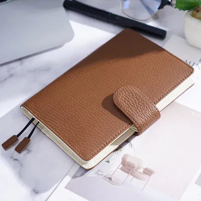 A6 loose-leaf diary with lychee pattern head layer cowhide cover in off white, pink, and white