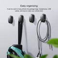 Black mini car hook made of PC and ABS with 3M adhesive, suitable for vehicle and home use.
