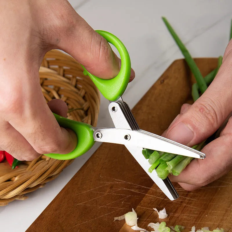 Green stainless steel multi-blade herb scissors with V-shaped design for cutting nori and green onions.
