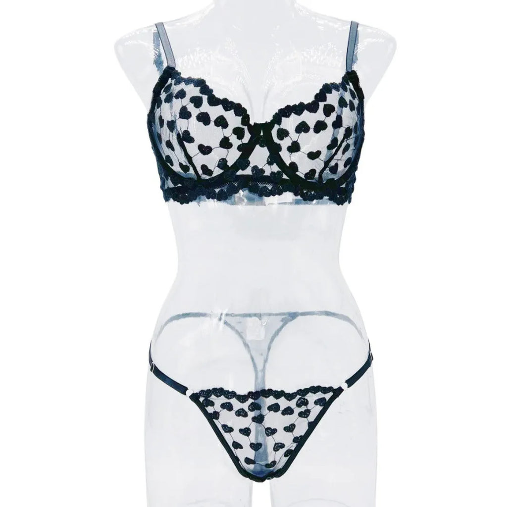 Women's black mesh two-piece suit with romantic multi-colour love print, showing V-neck top and straight-leg trousers