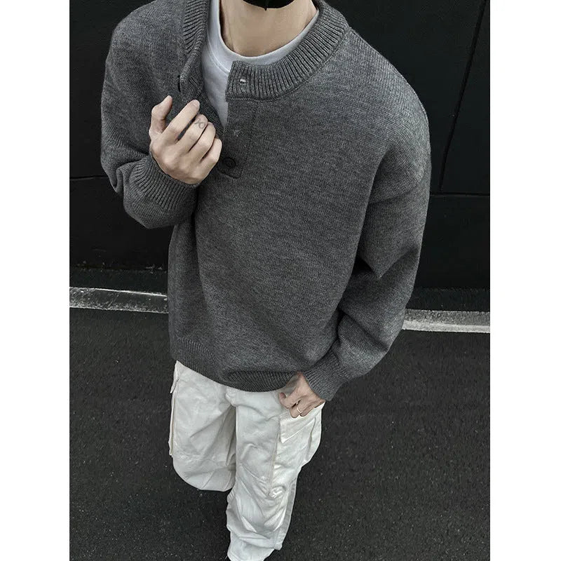 Men's loose long sleeve knit sweater in black, front view, casual pullover style