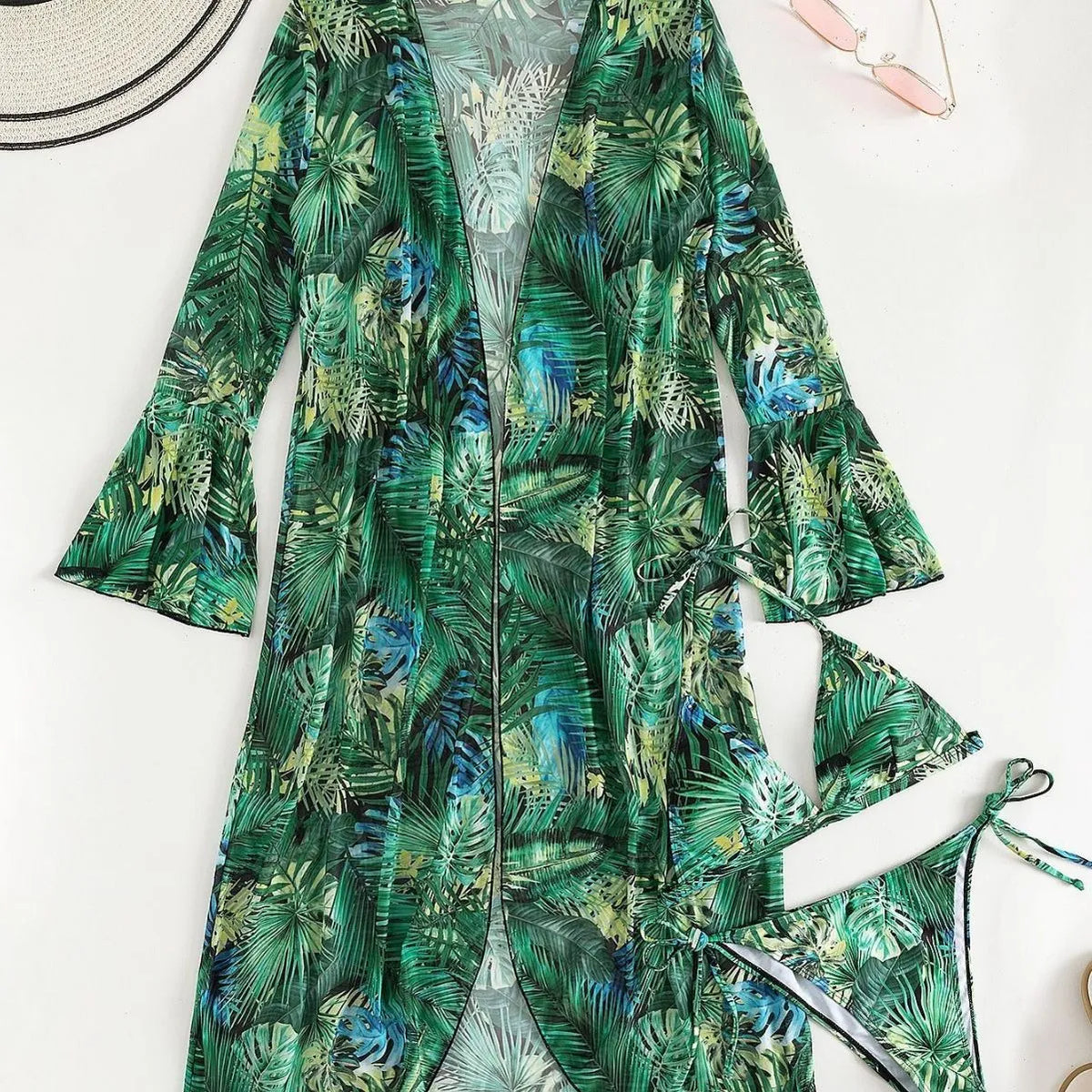 European and American printed three-piece swimsuit set with coat, top, and shorts in blue flower and green flower options.