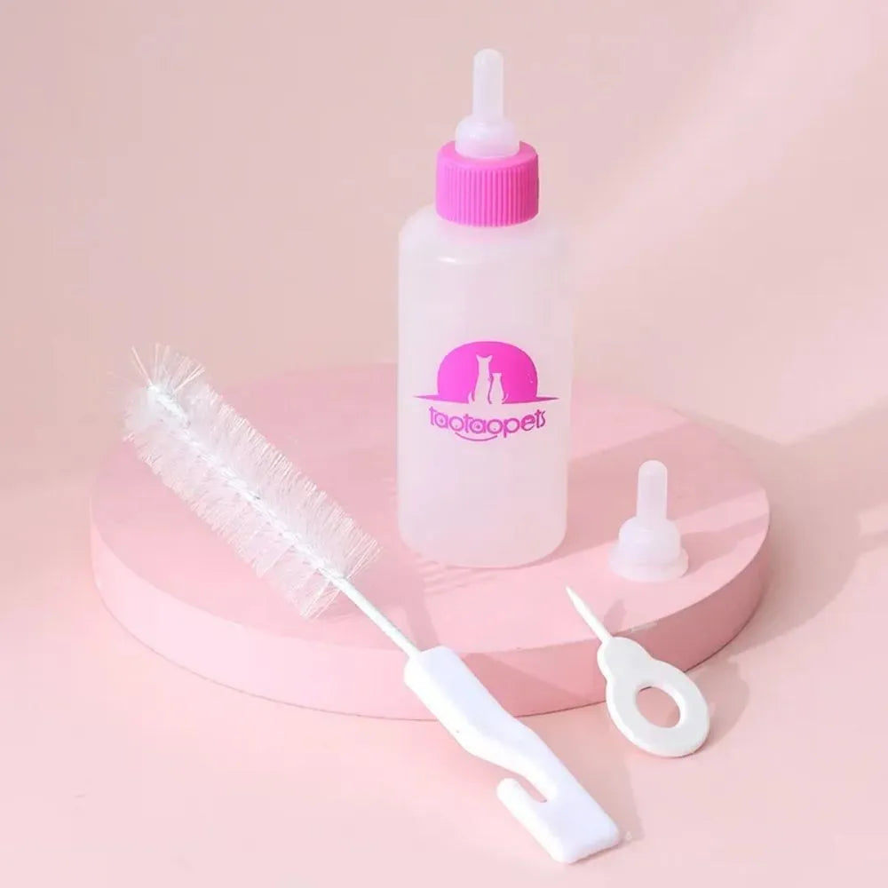 Set of four coloured pet milk bottles and a cleaning brush for feeding small animals