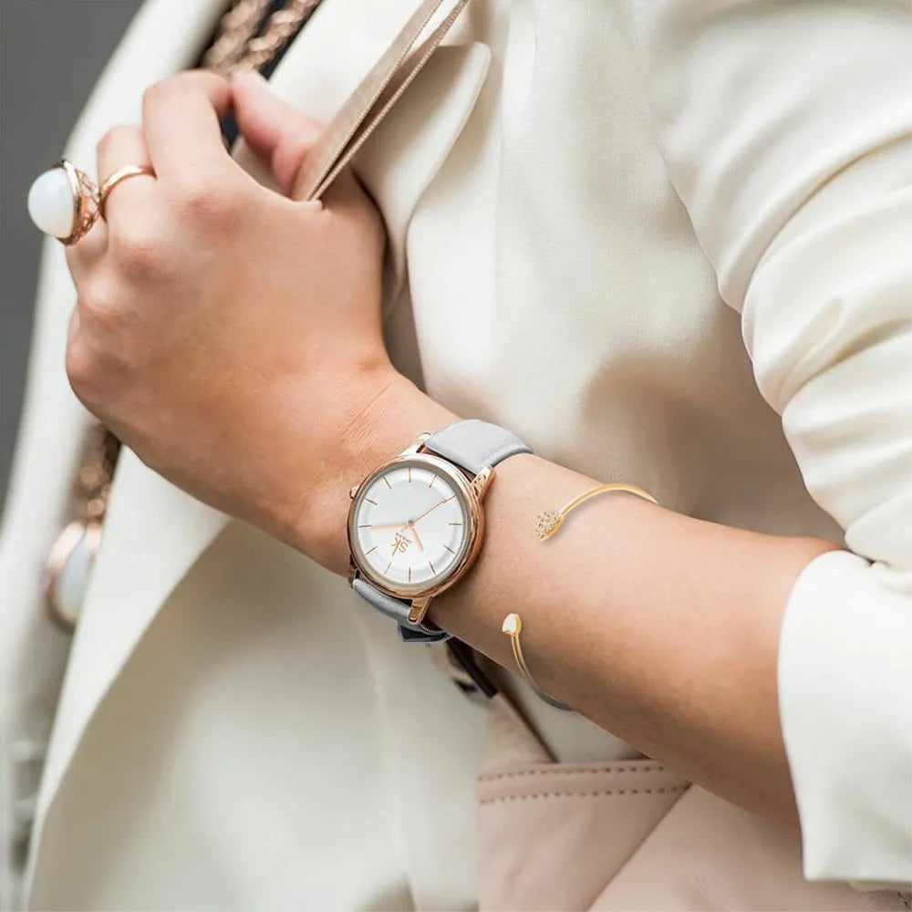 Women's quartz watch with round rose gold alloy case and white PU strap, 38mm dial, stainless steel buckle