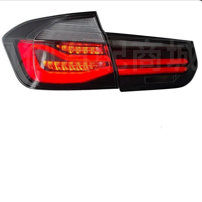 BMW 3 Series E90 aftermarket LED tail light assembly in red and smoked black finish.